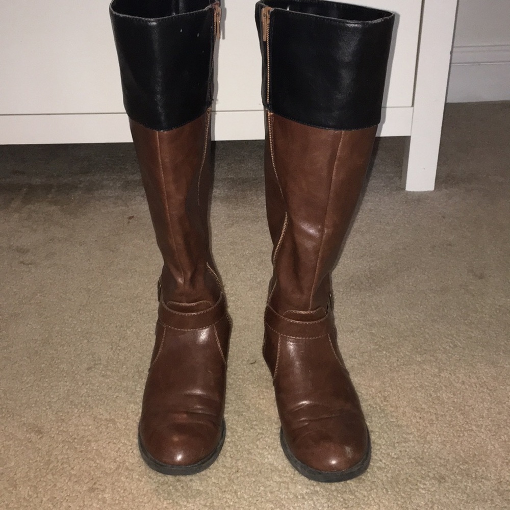 Black and brown riding boots